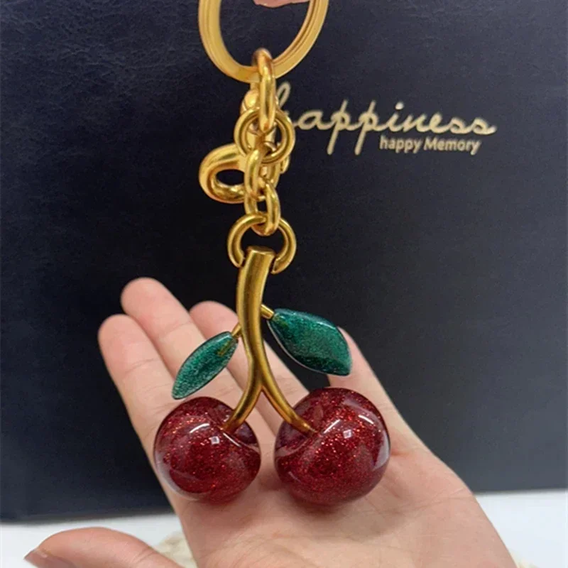 موضة الكرز المفاتيح الصيف الفو - مراجعة Women'S Accessories Coach وسعره