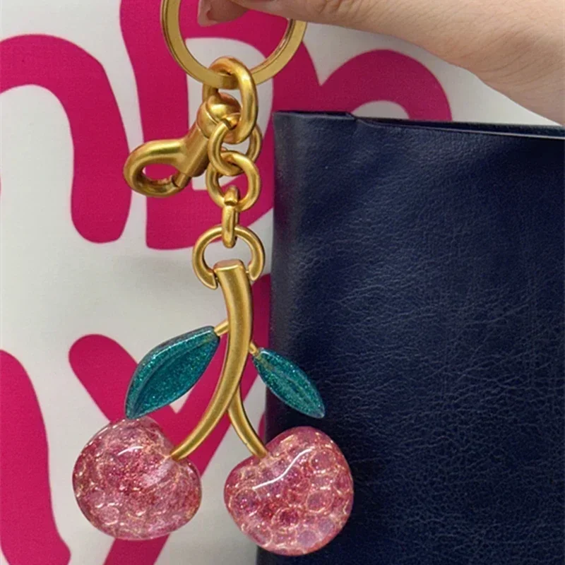 موضة الكرز المفاتيح الصيف الفو - مراجعة Women'S Accessories Coach وسعره